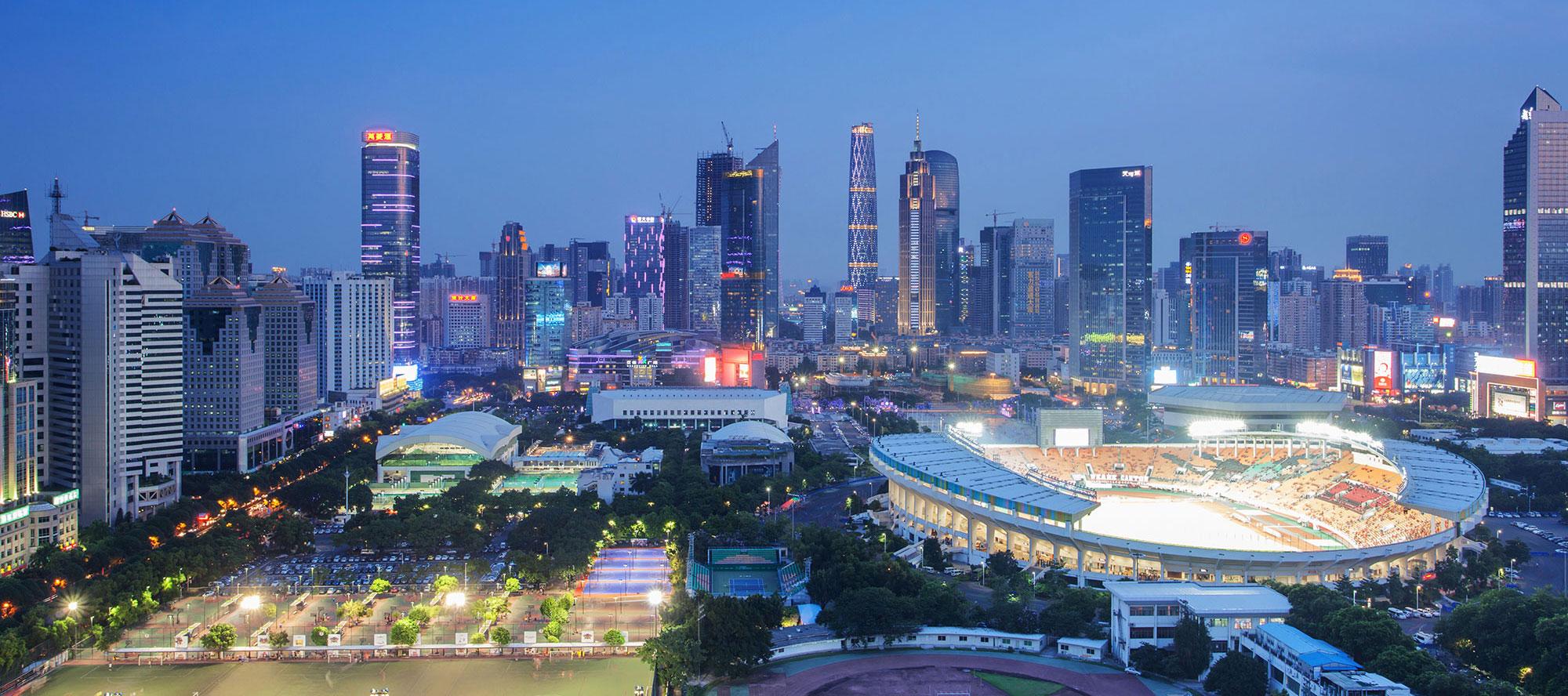 A smart city skyline at night, powered by smart solutions