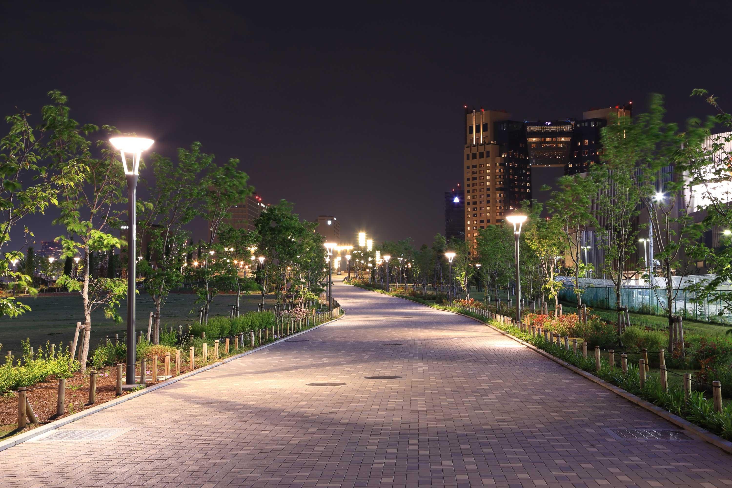 City park path at night, lit using smart lighting solution